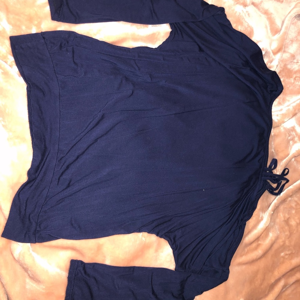 Super soft and stretchy off shoulder top.
